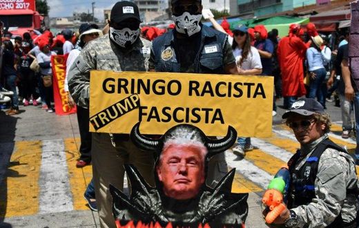 University students take part in the traditional "Huelga de Todos los Dolores" (Strike of All Sorrows) parade that takes place during Lent, and during which students satirize and make fun of politicians, in Guatemala City, on April 7, 2017
