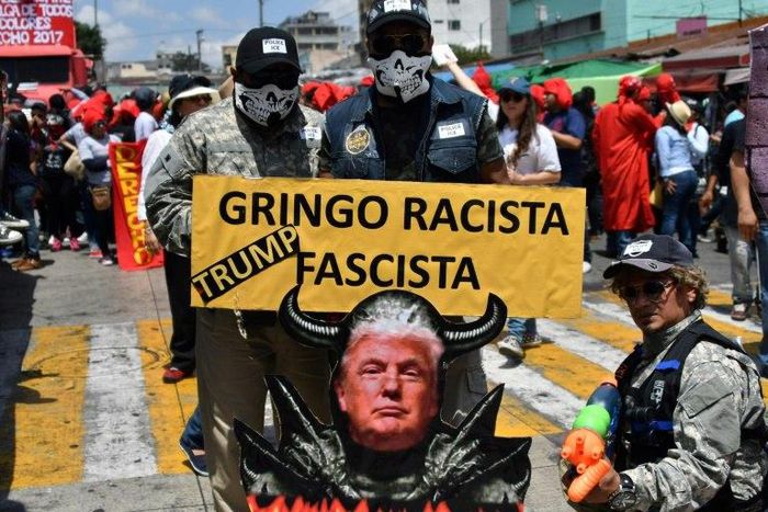 University students take part in the traditional "Huelga de Todos los Dolores" (Strike of All Sorrows) parade that takes place during Lent, and during which students satirize and make fun of politicians, in Guatemala City, on April 7, 2017