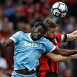 Stoke City's Mame Biram Diouf (L) vies with Bournemouth's Simon Francis during their English Premier League football match at the Vitality Stadium in Bournemouth, southern England on May 6, 2017