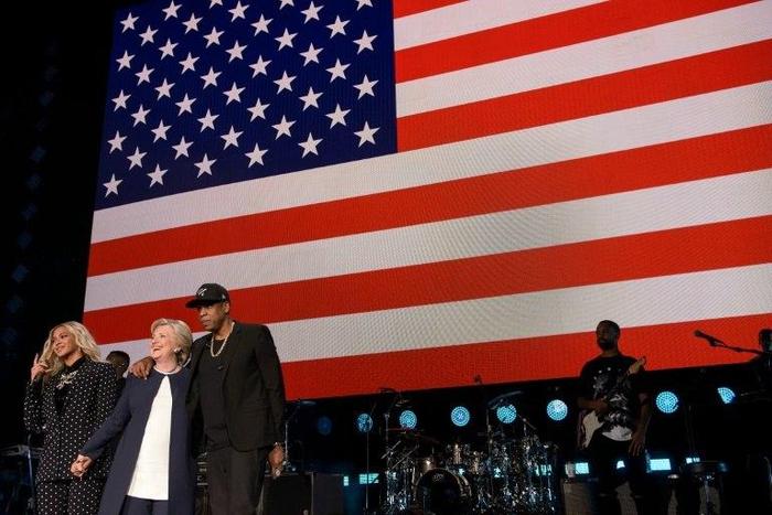 Music superstars such as Bruce Springsteen, Lady Gaga, Jon Bon Jovi and Beyonce (L) and Jay Z (R) are standing behind Democratic presidential nominee Hillary Clinton (C) in the final days of the US campaign