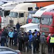 Russian long-distance truck drivers gather at a parking in Khimki, outside Moscow, on December 4, 2015, to protest against the Platon truck taxation system, a system against which truckers have launched a new protest