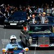 In this archive picture, Morocco's King Mohammed VI (right) and French President Francois Hollande wave to the crowds from their car on September 19, 2015 in the Moroccan port city of Tangier AFP PHOTO / POOL / ALAIN JOCARD
