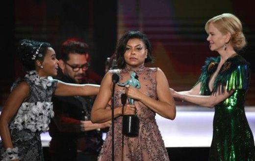 Actress Taraji P. Henson (C) accepts the award for Outstanding Performance by a Cast in a Motion Picture for 'Hidden Figures' during the 23rd Annual Screen Actors Guild Awards in Los Angeles