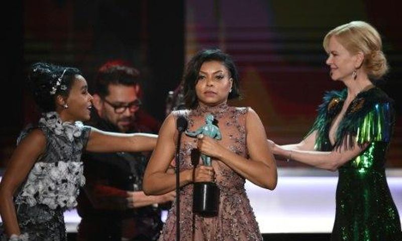 Actress Taraji P. Henson (C) accepts the award for Outstanding Performance by a Cast in a Motion Picture for 'Hidden Figures' during the 23rd Annual Screen Actors Guild Awards in Los Angeles