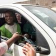 Ivor Kobina Greenstreet (C), Convention Peoples' Party (CPP) candidate for the December 7 presidential elections, meets supporters on November 30, 2016
