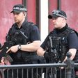 Armed police patrol near Manchester Arena on May 23, 2017 following a terror attack the previous evening