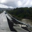 View of a bridge damaged by a 7.7-magnitude earthquake in Castro on Chiloe Island, southern Chile, on December 25, 2016