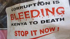 A banner bearing n anti-corruption message used during past protests (Twitter)