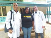 Dr Landy Rodriguez (R) and Herera Correa (L) with a Kenyan community worker (C)