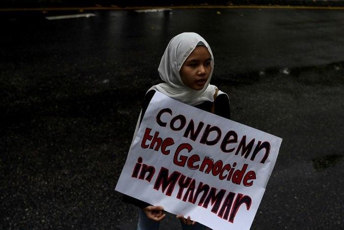 Protesters demonstrate in Kuala Lumpur against the treatment of Rohingya Muslims in Myanmar