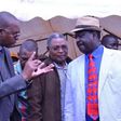 Taita Taveta governor John Mruttu explains a point to Cord leader Raila Odinga as Wundanyi MP Thomas Mwadeghu.