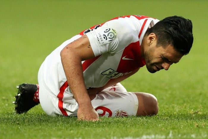 Monaco's Colombian forward Radamel Falcao grimaces in pain after falling during the French L1 football match against Bordeaux on March 11, 2017