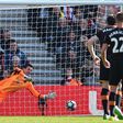 Hull City's Eldin Jakupovic dives to save the penalty kick taken by Southampton's Dusan Tadic during their match at St Mary's Stadium in Southampton, southern England on April 29, 2017
