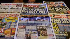 Turkish authorities have reportedly issued arrest warrants for the owner and three employees of opposition daily Sozcu seen displayed with other papers on an Istanbul newsstand