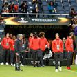 Manchester United's Portuguese manager Jose Mourinho (2nd L) and his players arrive to inspect the pitch at the Friends Arena in Solna outside Stockholm on May 23, 2017