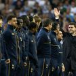Tottenham Hotspur's head coach Mauricio Pochettino (R) waves to the crowd as the team members stand on the field during the closing ceremony at White Hart Lane in London, on May 14, 2017
