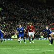 Manchester United's striker Zlatan Ibrahimovic shoots from the penalty spot to scores his team's first goal during the English Premier League football match against Everton at Old Trafford in Manchester, England, on April 4, 2017
