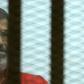 Egypt's former president Mohamed Morsi, pictured in June at a court in Cairo