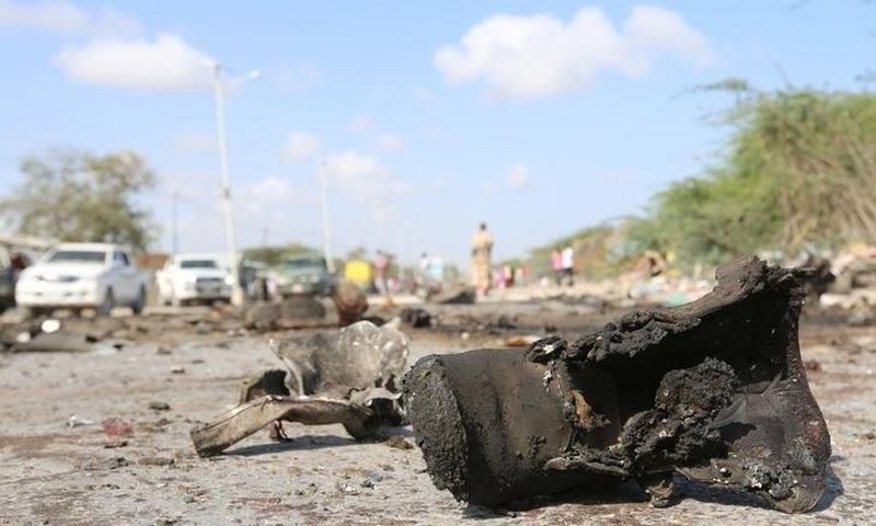 A military boot is seen at the scene of a suicide car bomb attack by al Shabaab in Somalia's capital Mogadishu, Somalia, September 18, 2016. REUTERS/Feisal Omar