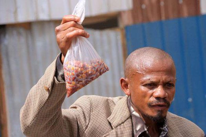 Kenya's githeri man holding his githeri (Courtesy)
