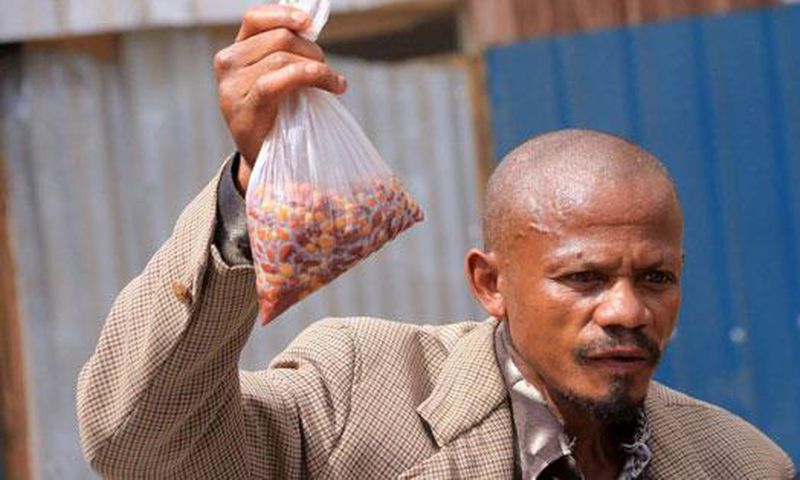 Kenya's githeri man holding his githeri (Courtesy)