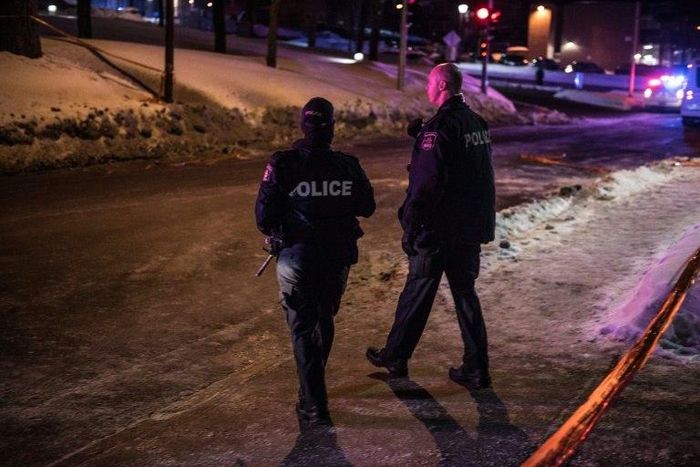 Canadian police officers patrol after a shooting in a mosque at the Quebec City Islamic cultural center on January 29, 2017