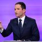 Former French education minister and candidate in the left-wing primary for the 2017 French presidential election, Benoit Hamon speaks during a televised debate with opposing candidate former French prime minister Manuel Valls