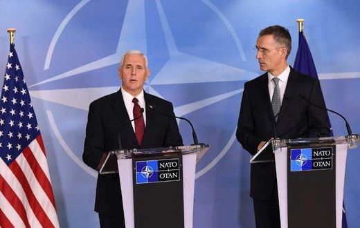 NATO Secretray General Jens Stoltenberg (R) and US Vice-President Mike Pence (L) give a press conference after a meeting at the NATO headquarters in Brussels on February 20, 2017