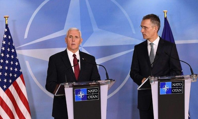 NATO Secretray General Jens Stoltenberg (R) and US Vice-President Mike Pence (L) give a press conference after a meeting at the NATO headquarters in Brussels on February 20, 2017