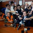 San Juan's province Mining Minister Alberto Hensel (C) speaking during a press conference in San Juan, west of Argentina on March 30, 2017