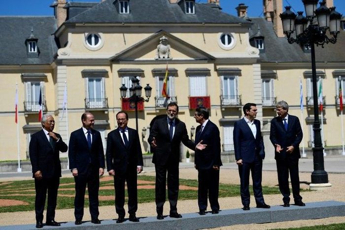 Spanish Prime Minister Mariano Rajoy (centre) marshalls his fellow southern European leaders into posing for a group photo at the Palacio del Pardo, near Madrid, on April 10, 2017