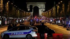 The gunman opened fire on a police van just a few hundred metres from the iconic Arc de Triomphe