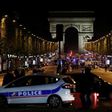 The gunman opened fire on a police van just a few hundred metres from the iconic Arc de Triomphe