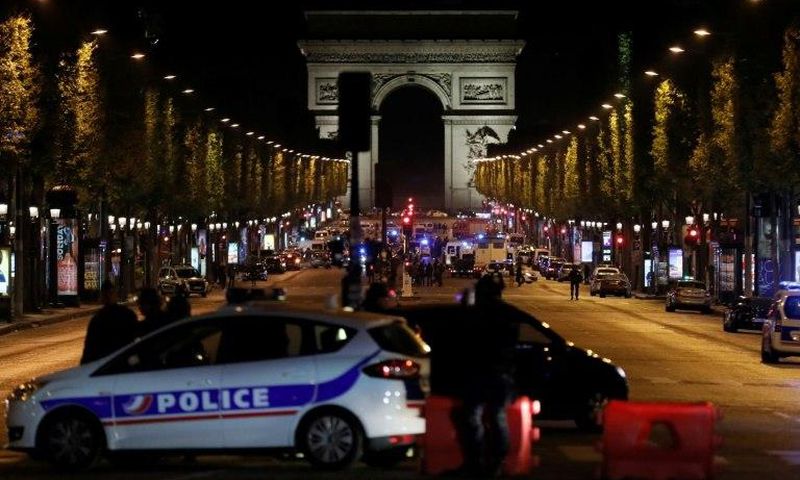 The gunman opened fire on a police van just a few hundred metres from the iconic Arc de Triomphe