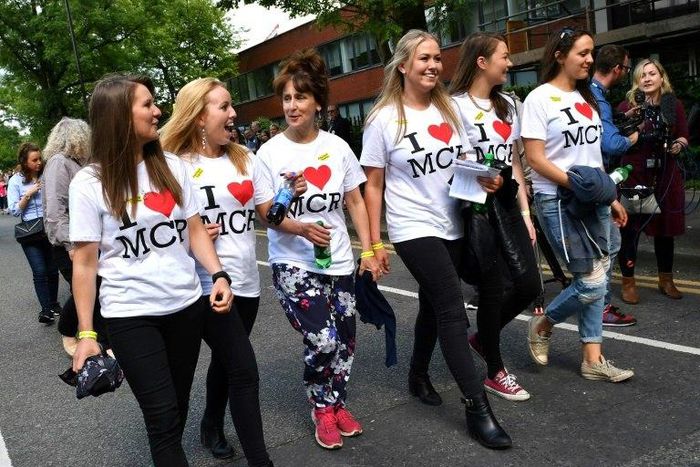 Women arrive for the One Love Manchester tribute concert on June 4, 2017