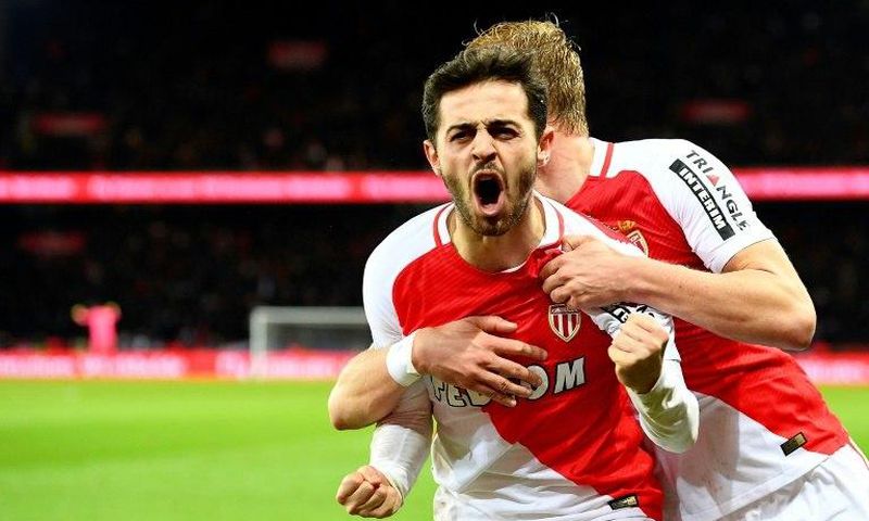 Monaco's Portuguese midfielder Bernardo Silva (C) celebrates after scoring a goal during the French L1 football match between Paris Saint-Germain and Monaco on January 29, 2017