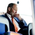 Dutch national soccer team head coach Danny Blind arrives at Schiphol Airport in Amsterdam on March 26, 2017