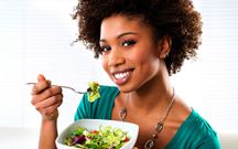 Woman eating vegetables(ebony)