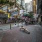 Ou Zhihang's photographs himself exercising nude at sites such as the Hong Kong bookstore linked to the disappearance of five booksellers