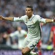 Real Madrid's striker Cristiano Ronaldo celebrates after his second goal during the UEFA Champions League quarter-final second leg football match Real Madrid vs FC Bayern Munich at the Santiago Bernabeu stadium in Madrid in Madrid on April 18, 2017