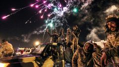 Libyans take part in a celebration with fireworks marking the sixth anniversary of the Libyan revolution, which toppled strongman Moamer Kadhafi, in Benghazi on February 17, 2017