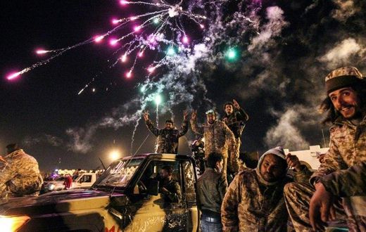 Libyans take part in a celebration with fireworks marking the sixth anniversary of the Libyan revolution, which toppled strongman Moamer Kadhafi, in Benghazi on February 17, 2017