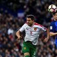 France's forward Kevin Gameiro (R) and Bulgaria's forward Dimitar Rangelov head the ball during the FIFA World Cup 2018 qualifying football match France vs Bulgaria on October 7, 2016