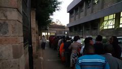 Kenyans queuing at a govt office (Twitter @currie_powder)