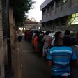 Kenyans queuing at a govt office (Twitter @currie_powder)