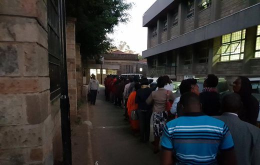 Kenyans queuing at a govt office (Twitter @currie_powder)