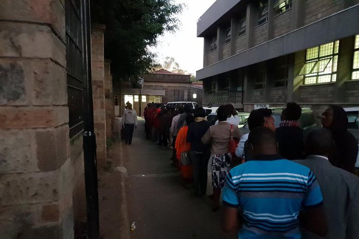 Kenyans queuing at a govt office (Twitter @currie_powder)