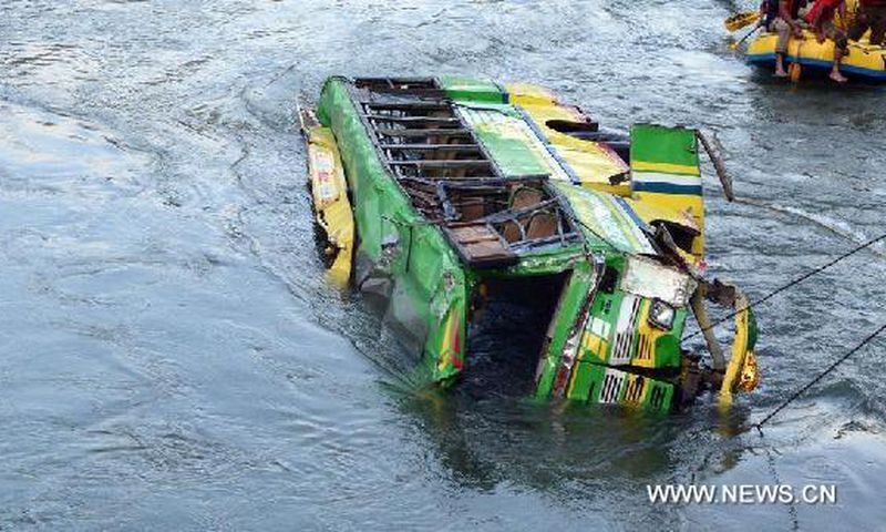 Police say 44 die as bus falls into river