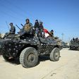 Iraqi security forces advance towards the the village of al-Buseif on February 21, during their offensive to retake western Mosul