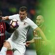 AS Roma's forward Edin Dzeko (C) vies with AC Milan's defender Cristian Zapata during the Italian Serie A football match AC Milan vs AS Roma at the San Siro stadium in Milan on May 7, 2017